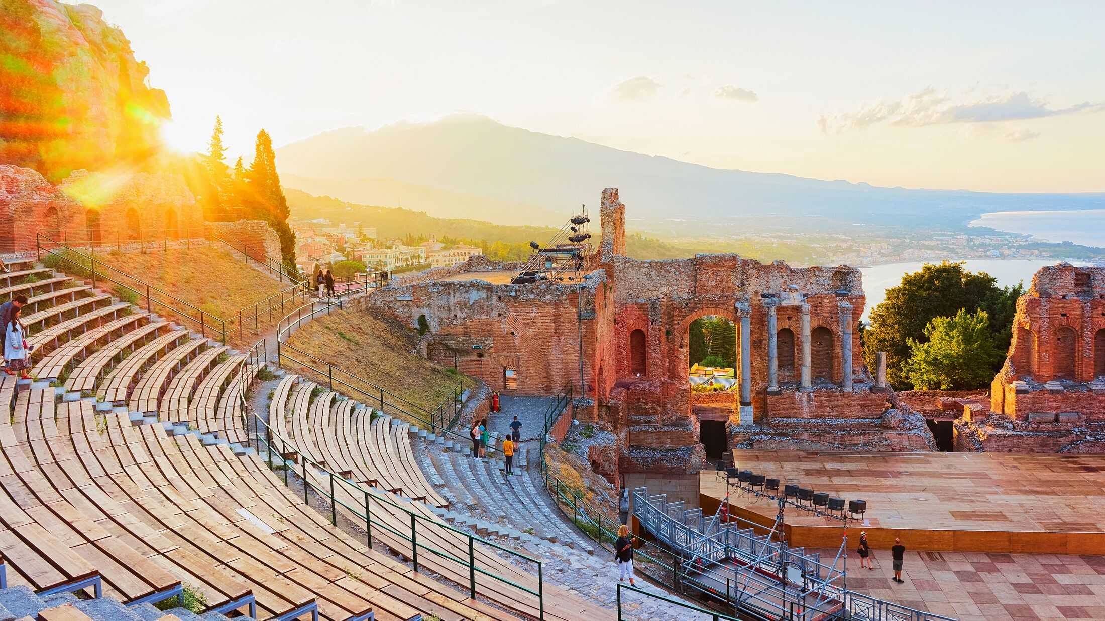 Sunset at Greek theater of Taormina, Sicily, Italy. Travel