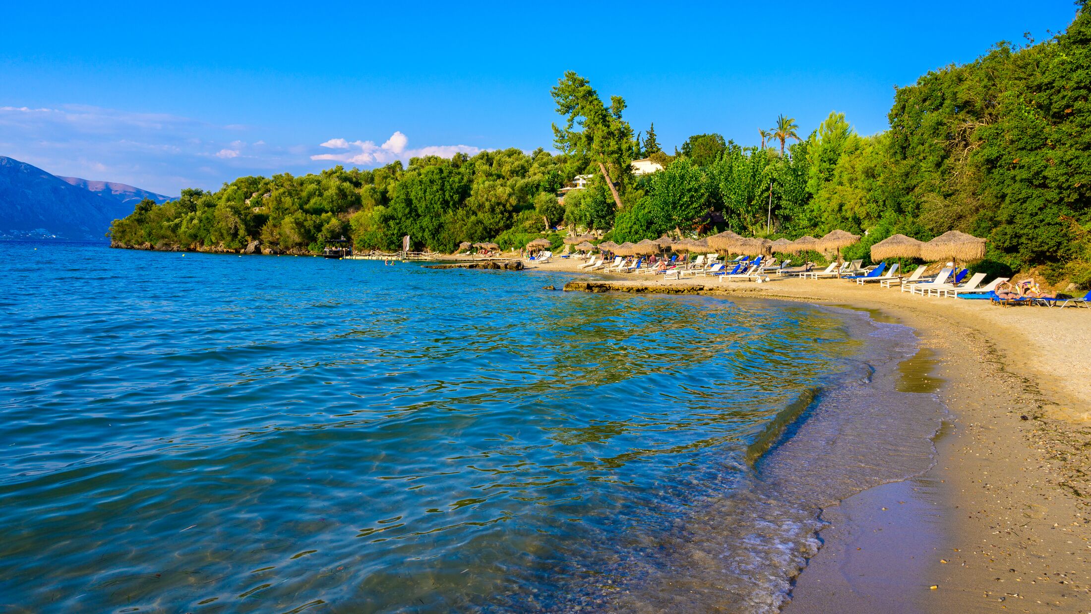 Spilios beach at Kommeno is close to Kerkyra is a paradise beach with crystal clear azure water in Corfu, Ionian island, Greece, Europe