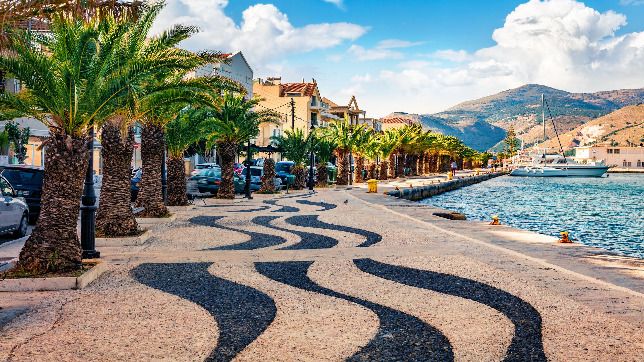 Attractive spring cityscape of Argostoli port. Romantic morning scene of Kefalonia island, Greece, Europe. Beautiful seascape of Ionian Sea. Traveling concept background.