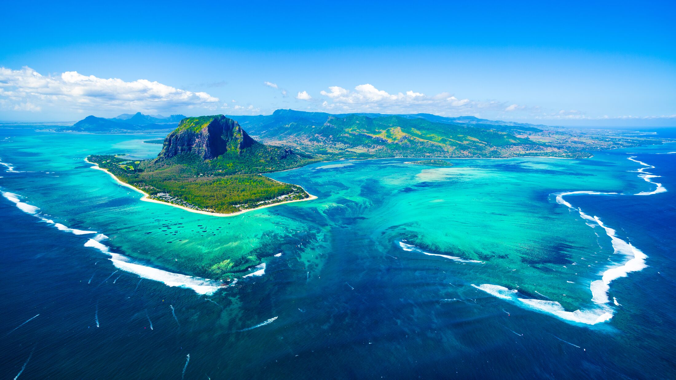 Aerial view of Mauritius island panorama and famous  Le Morne Brabant mountain, beautiful blue lagoon and underwater waterfall