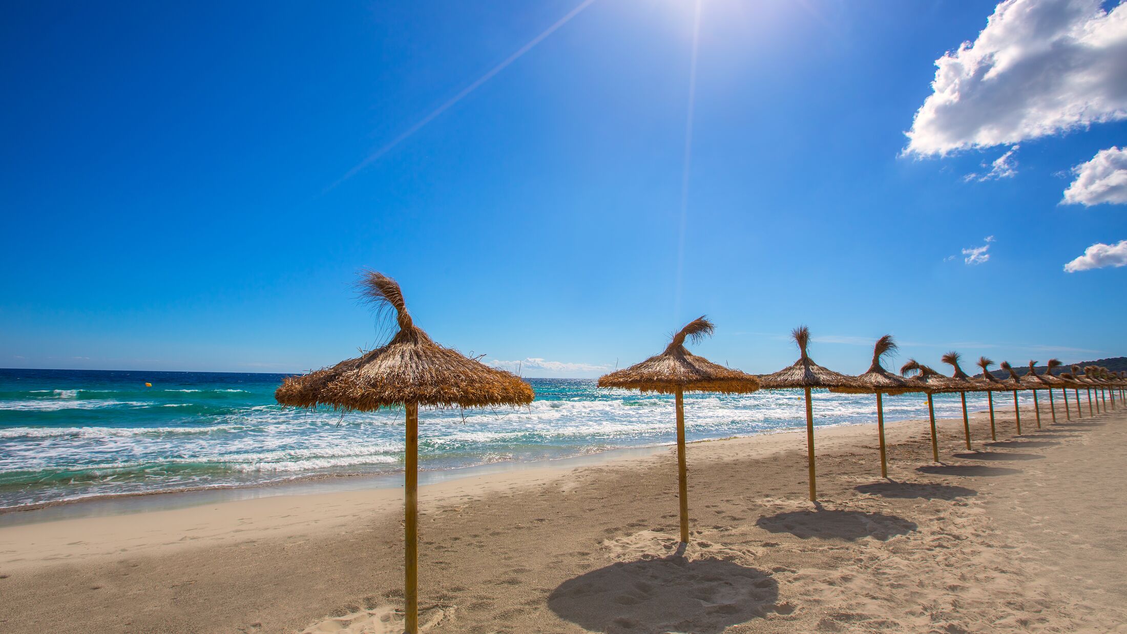 Menorca sunroof row tropical beach at Balearic islands of Spain