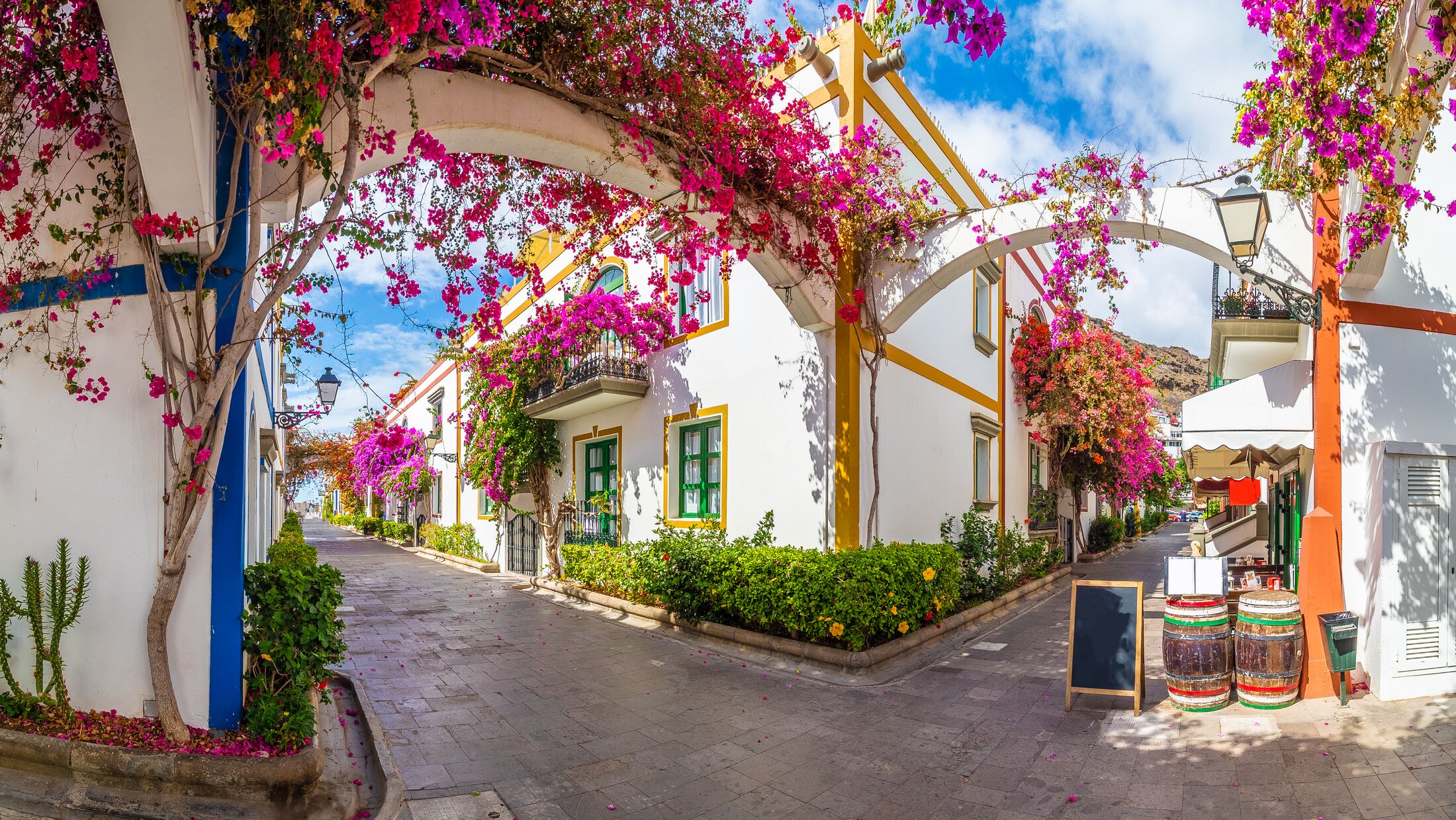 Street with flowers in Puerto de Mogan, Gran Canaria island, Spain