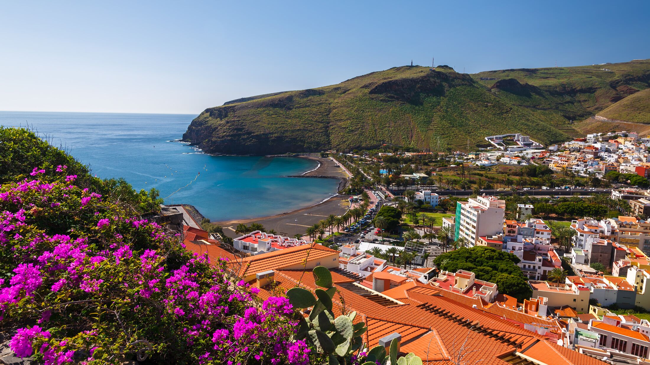 VIew bay beach mountain ocean coast flowers, Playa de Santiago, La Gomera, Canary Islands