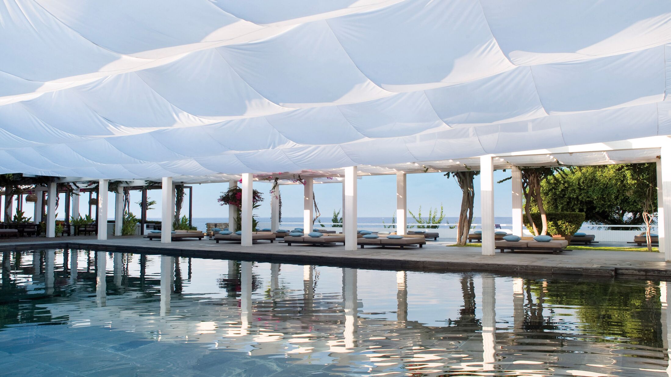a group of people sitting in the water