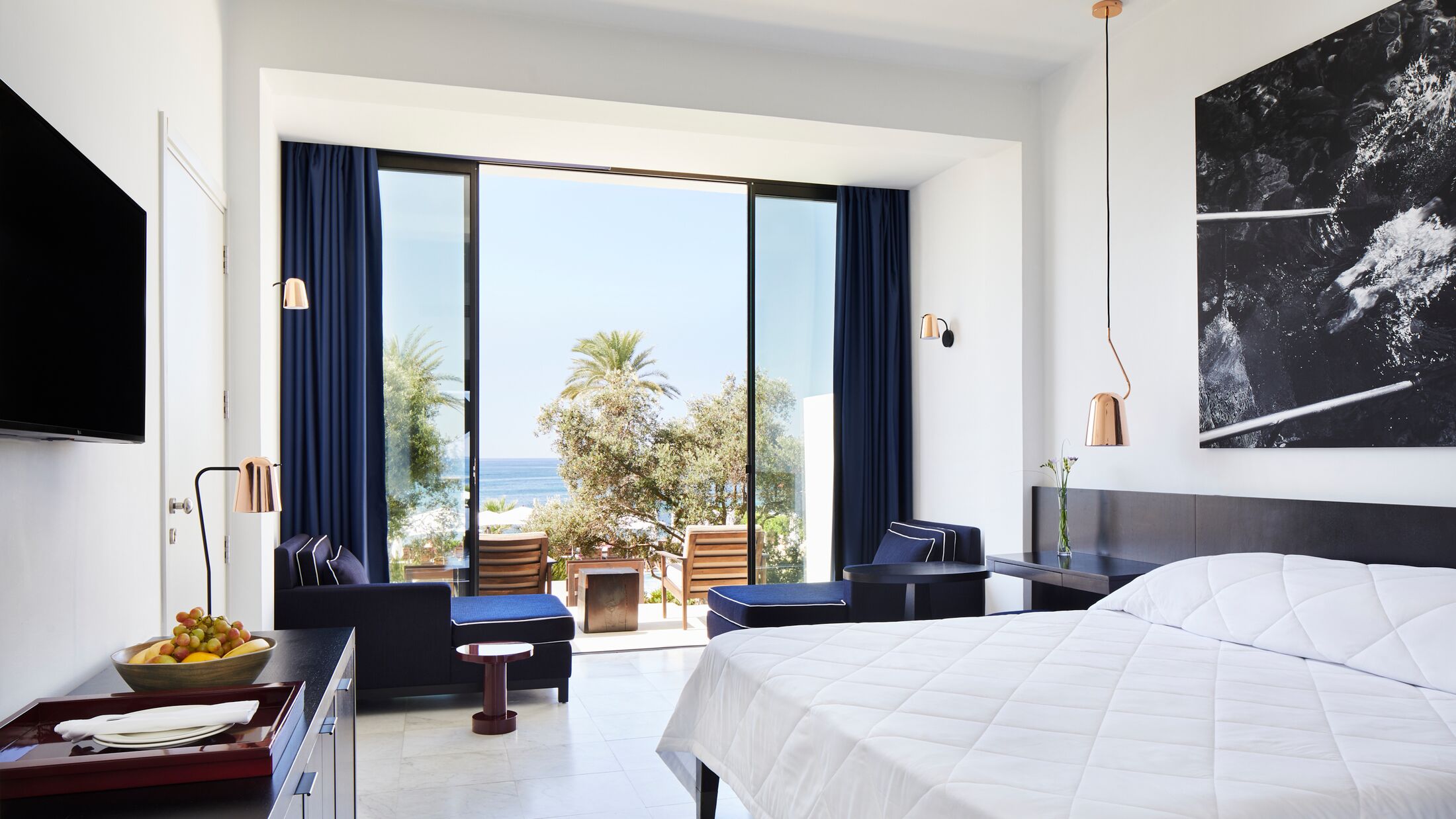 a bedroom with a large window