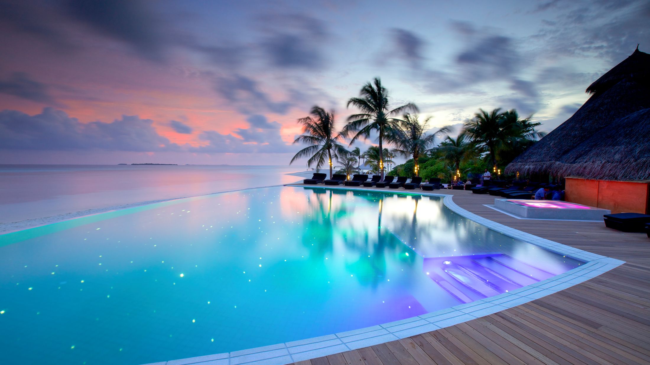 a pool next to a body of water