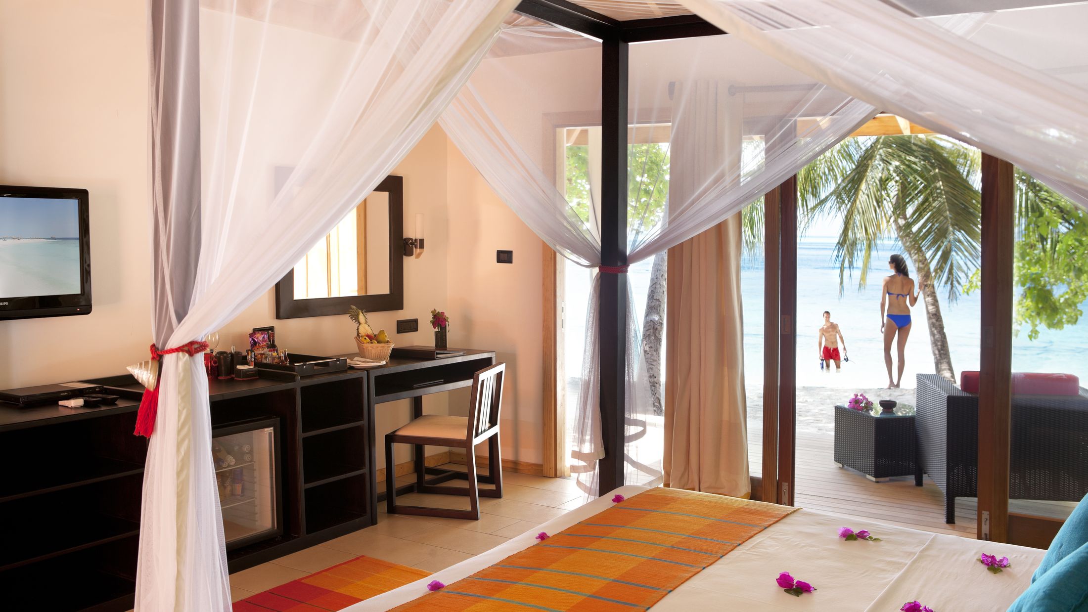 a bedroom with a large window