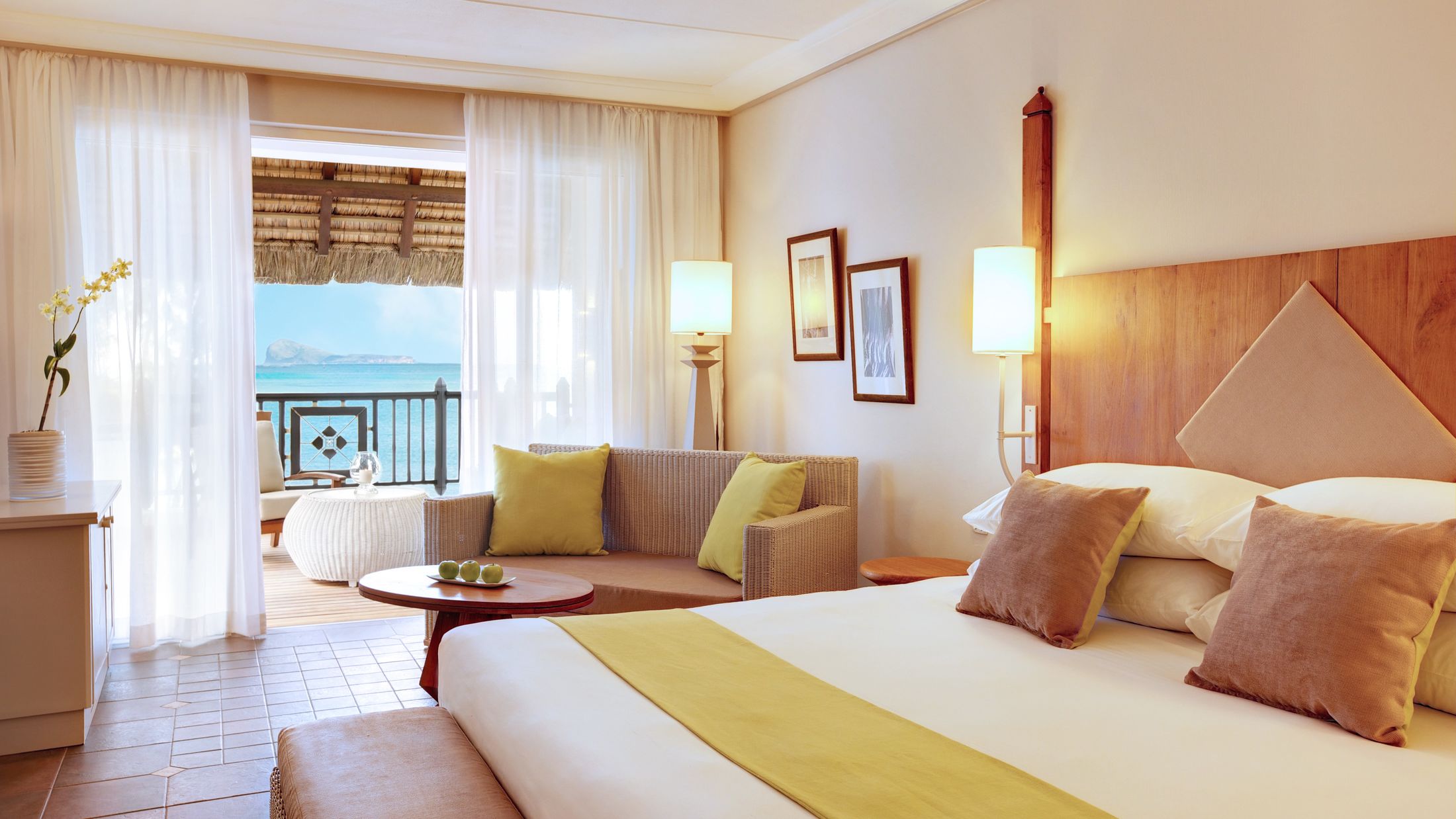 a bedroom with a large bed in a hotel room