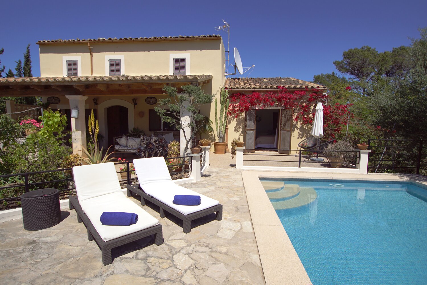 a statue in front of a house