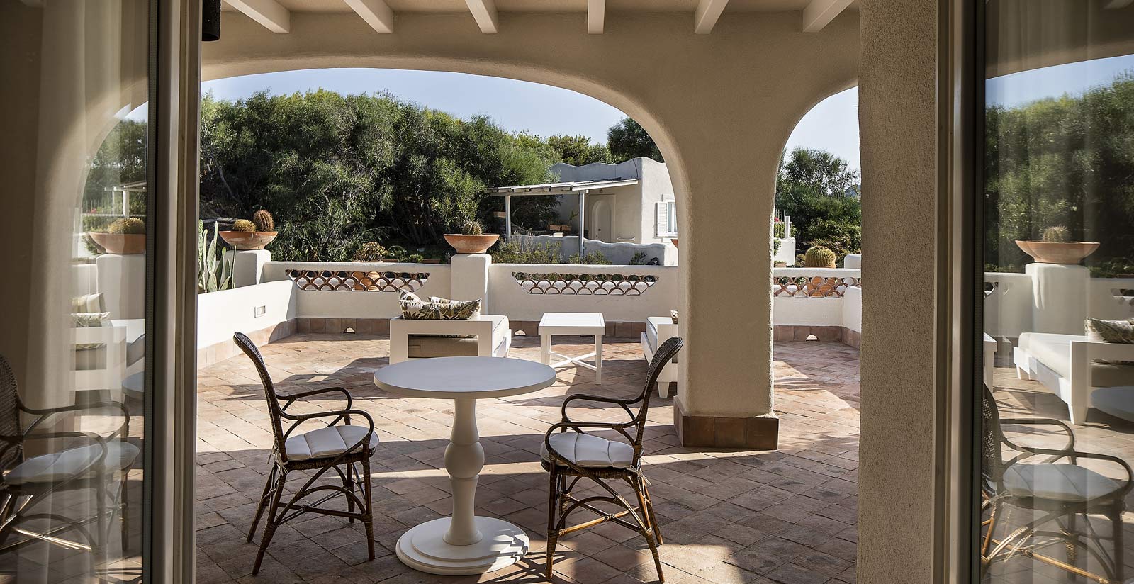 a room filled with furniture and a large window