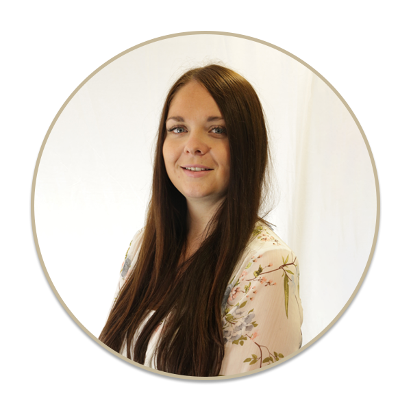 a woman standing in front of a mirror posing for the camera