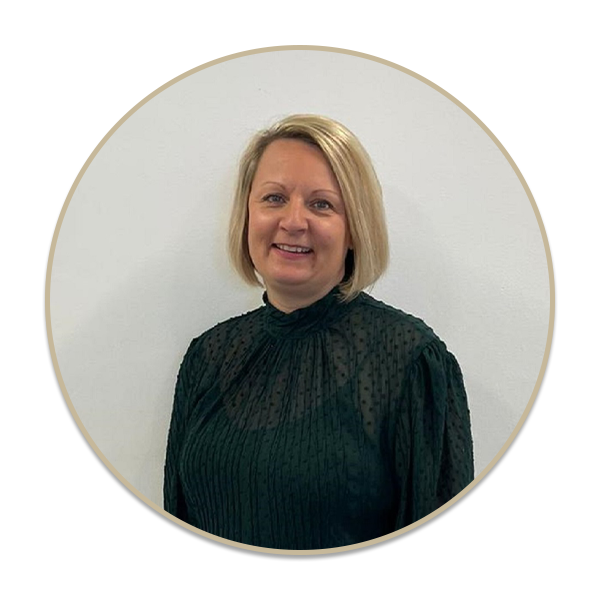 a woman standing in front of a mirror posing for the camera