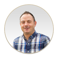 a man smiling for the camera