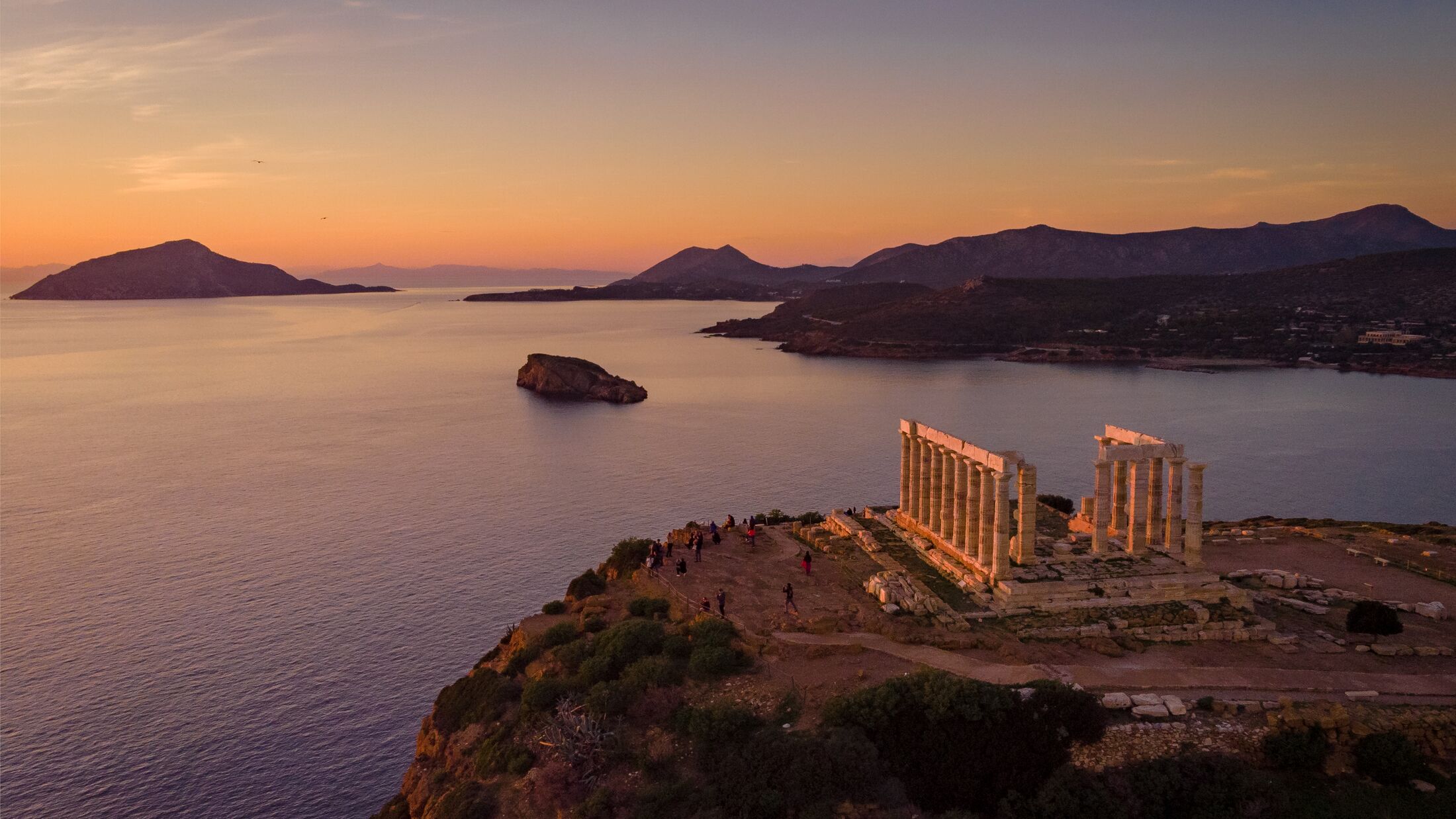 Sunset over the Temple of Poseidon at Cape Sounio, Greece.