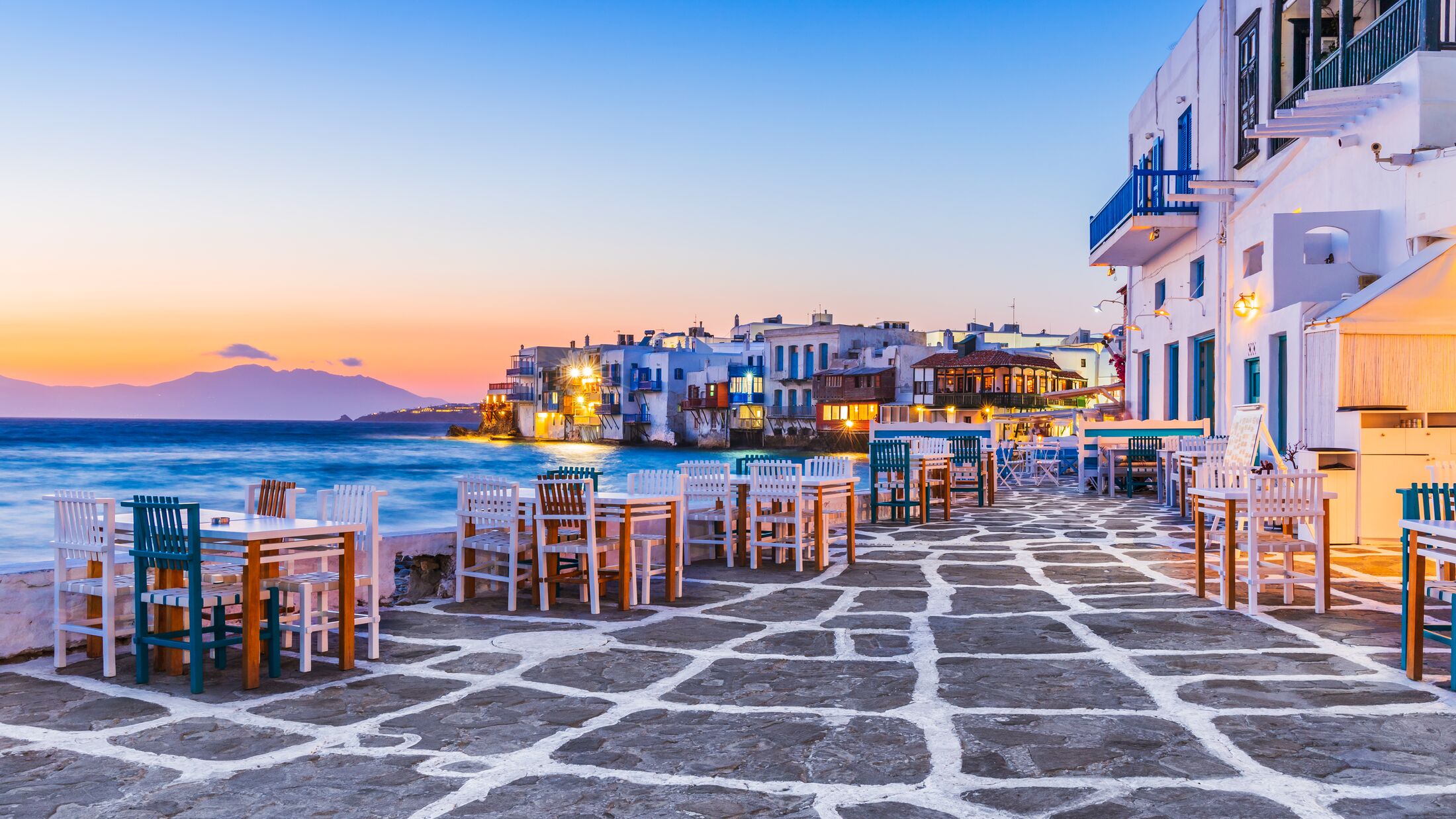 Mykonos, Greece. Waterfront in Little Venice, Mykonos at sunset.