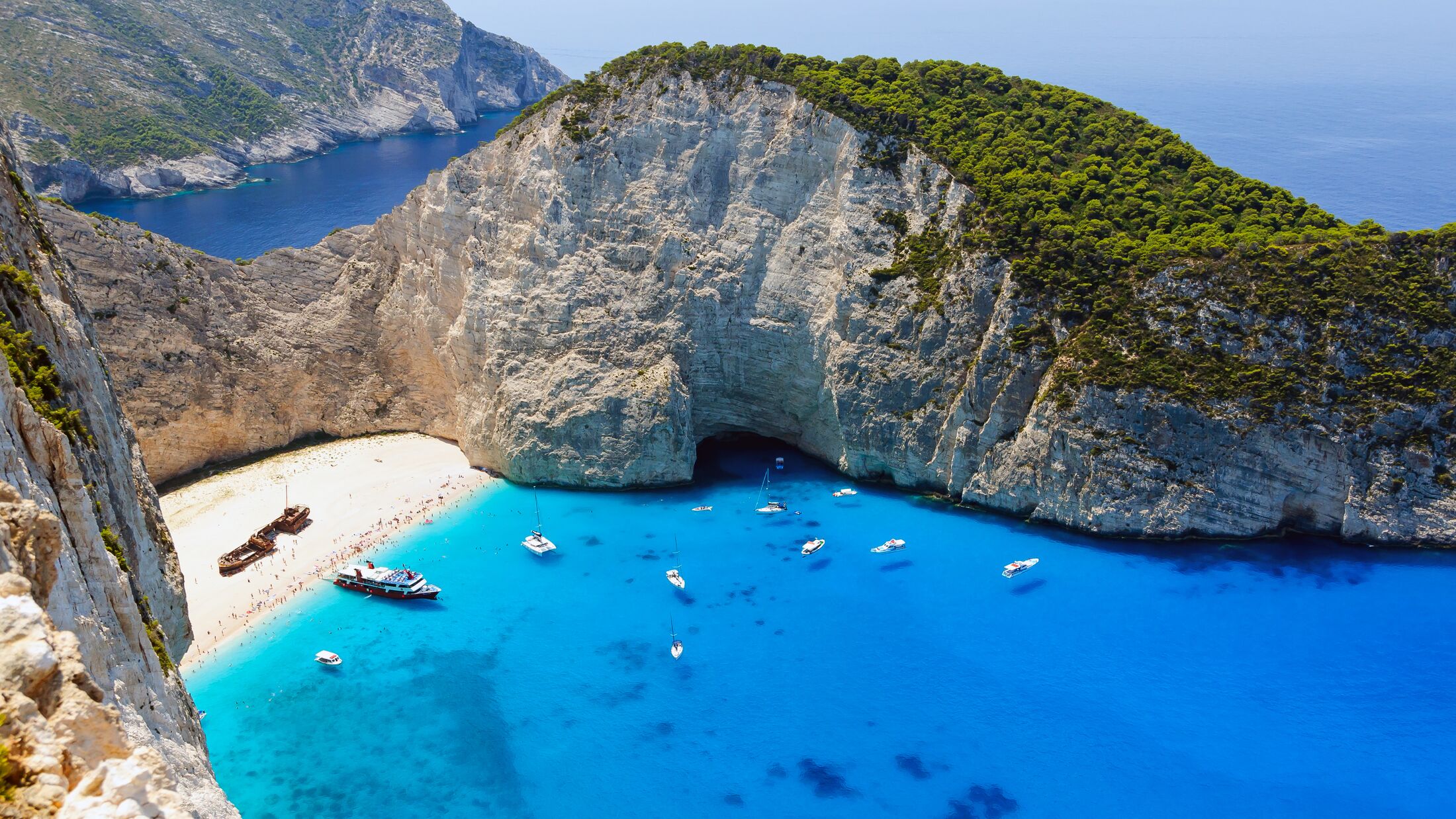 Shipwreck bay with turquoise water and pebble white beach on Zakynthos island, Greece