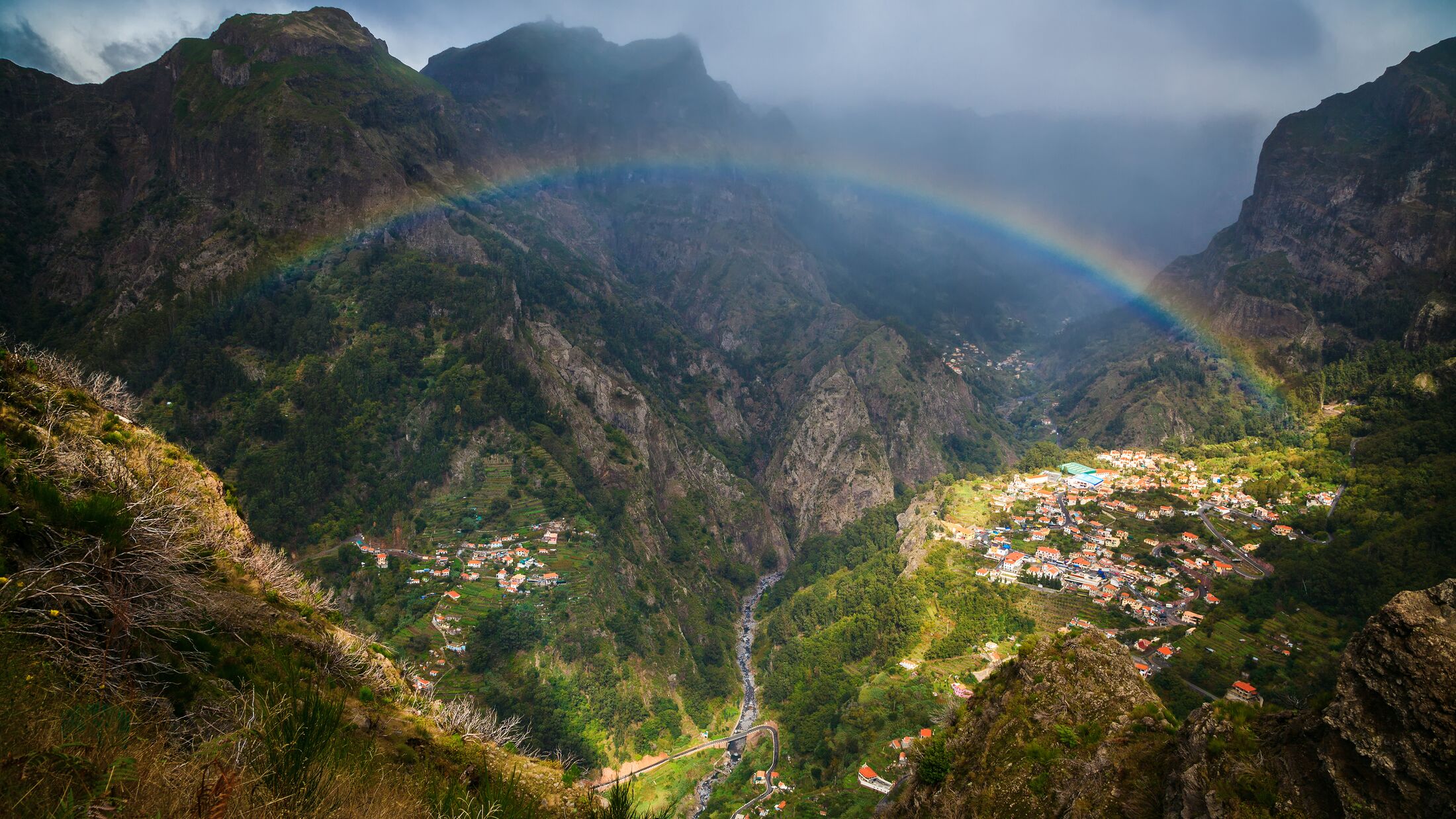 panoramic view of the rainbow above Nun's Valley, Madeira, Portugal