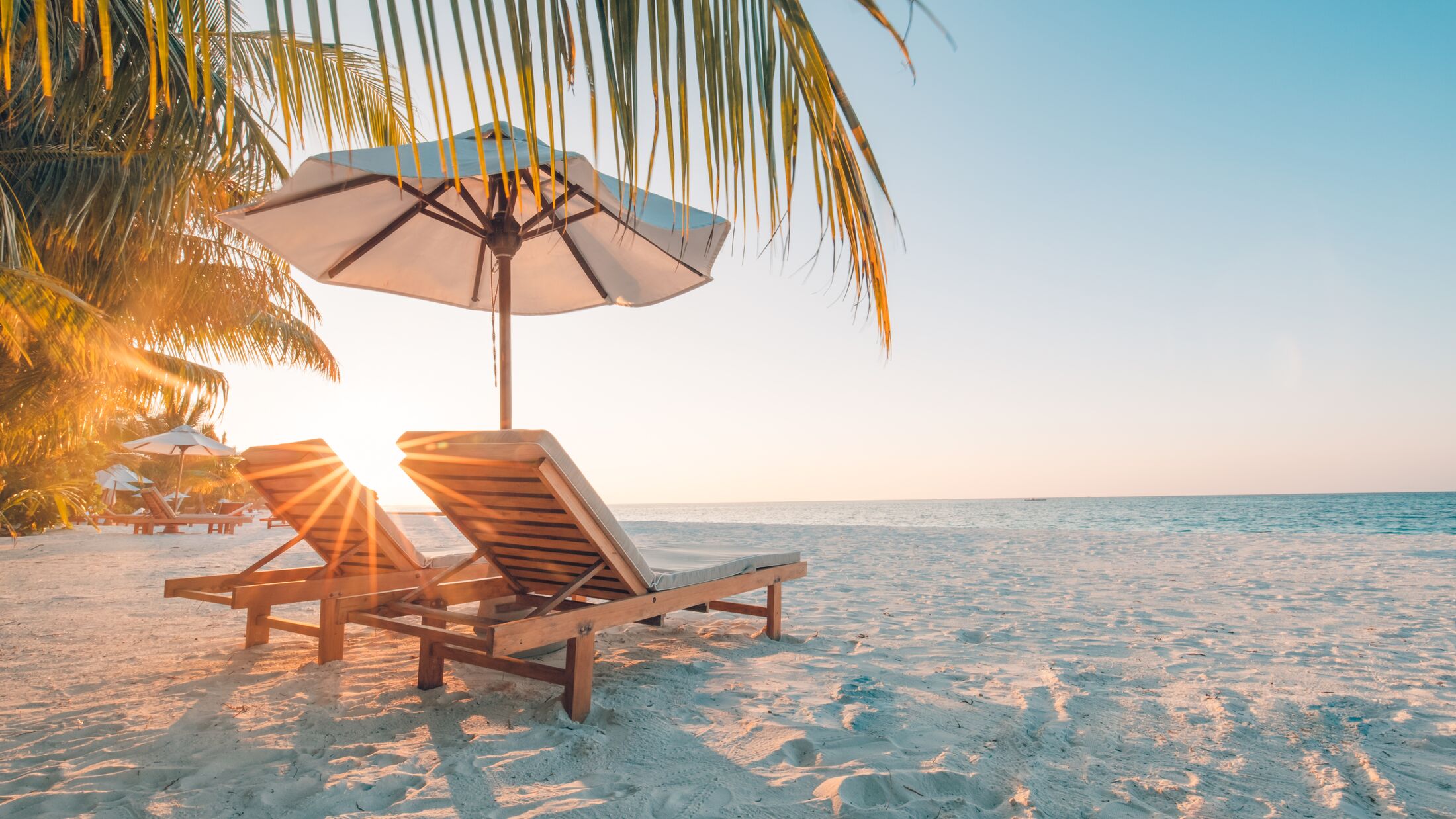 Beautiful beach. Chairs on the sandy beach near the sea. Summer holiday and vacation concept for tourism. Inspirational tropical landscape