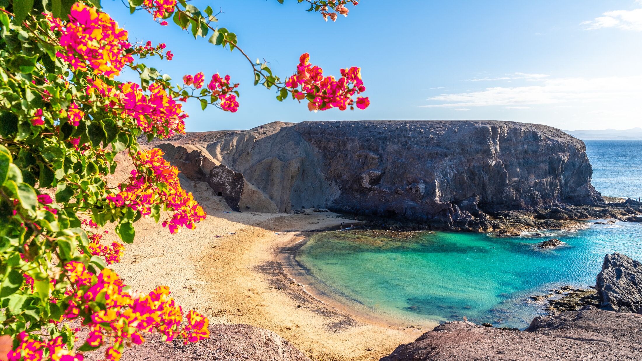 Landscape with turquoise ocean water on Papagayo beach, Lanzarote, Canary Islands, Spain