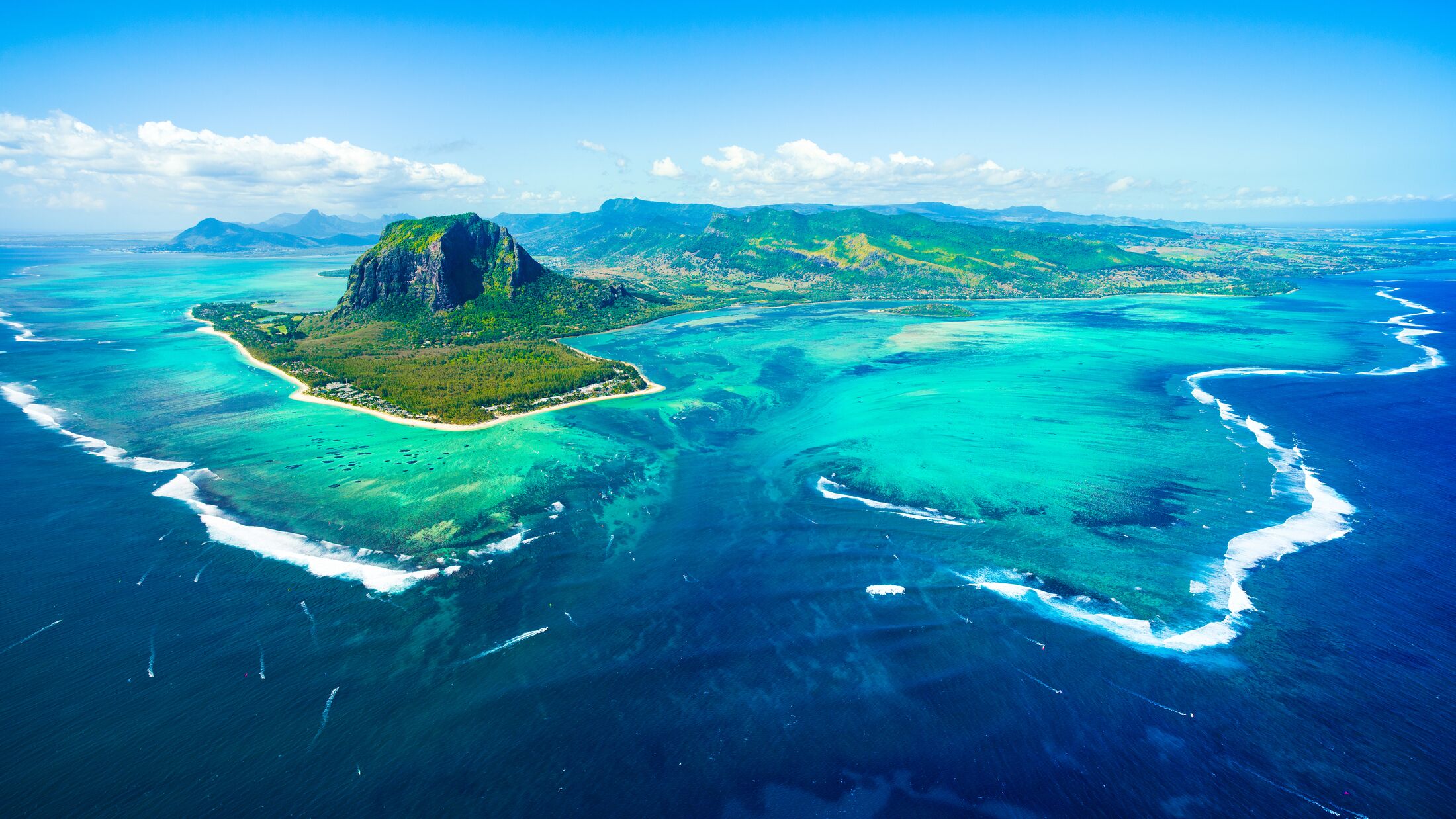 Aerial view of Mauritius island panorama and famous  Le Morne Brabant mountain, beautiful blue lagoon and underwater waterfall