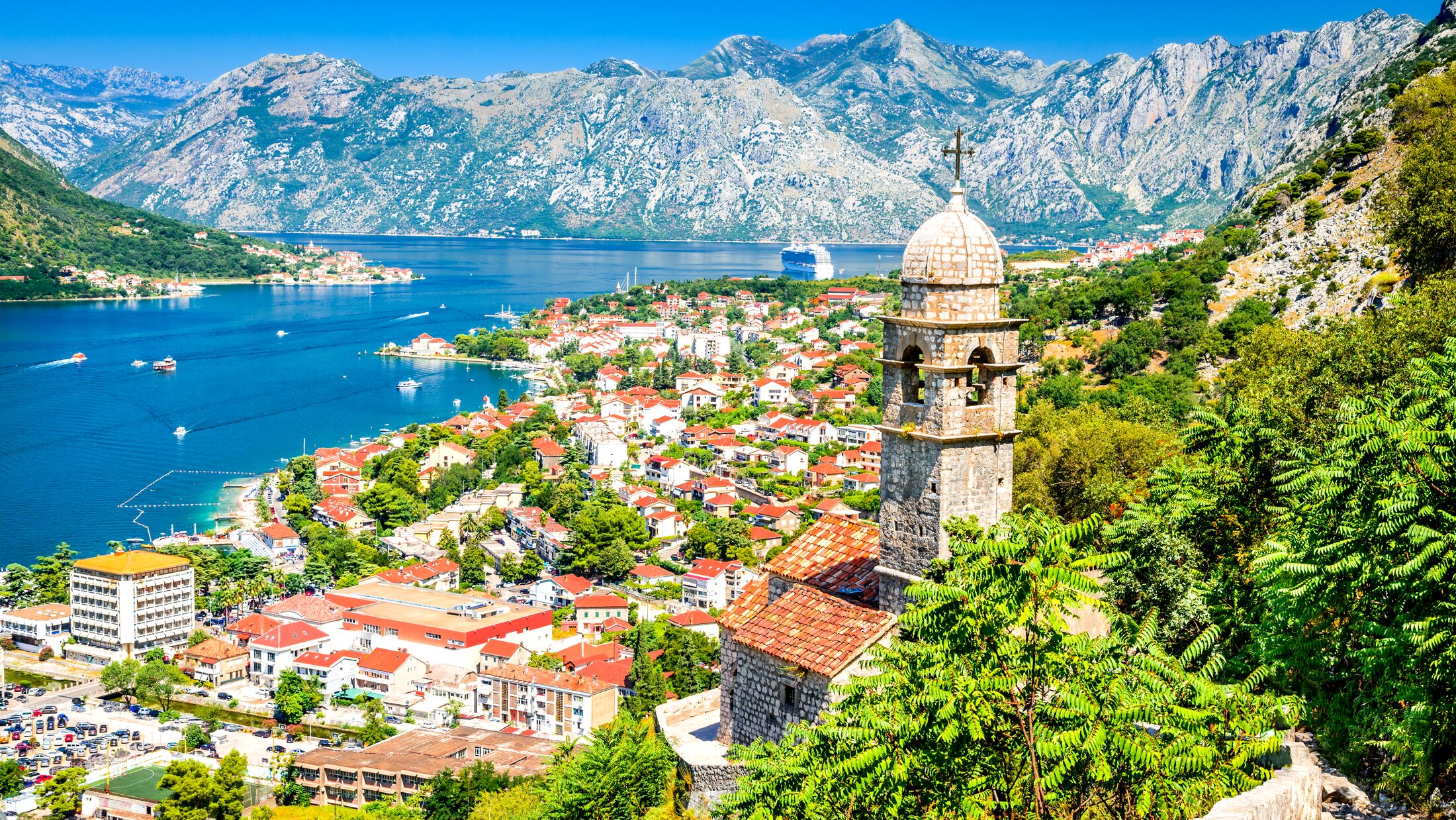 Kotor, Montenegro. Bay of Kotor bay is one of the most beautiful places on Adriatic Sea, it boasts the preserved Venetian fortress, old tiny villages, medieval towns and scenic mountains.