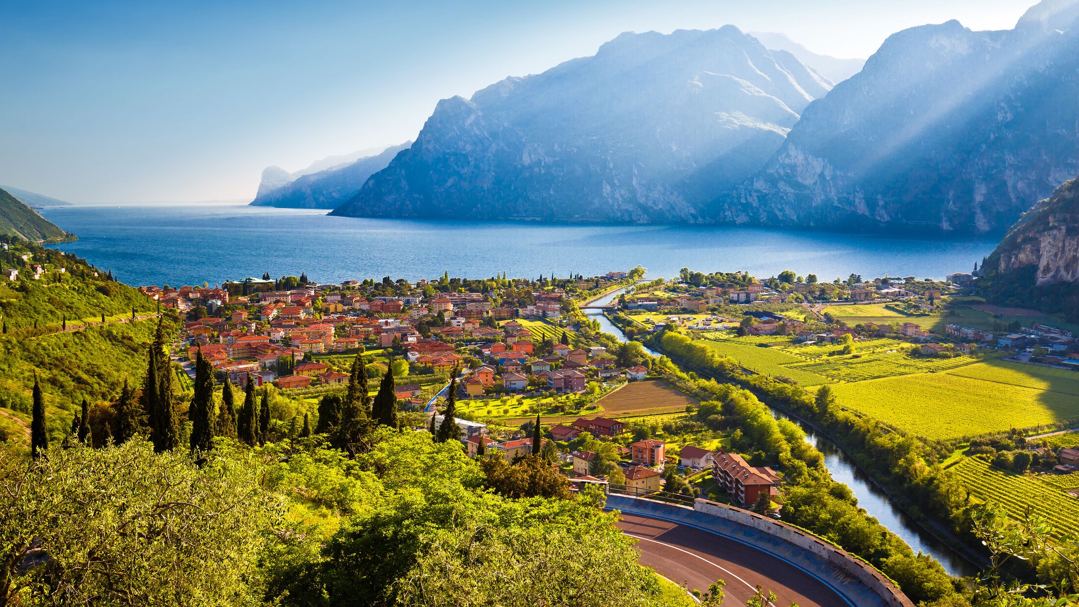 Town of Torbole and Lago di Garda sunset view, Trentino Alto Adige region of Italy