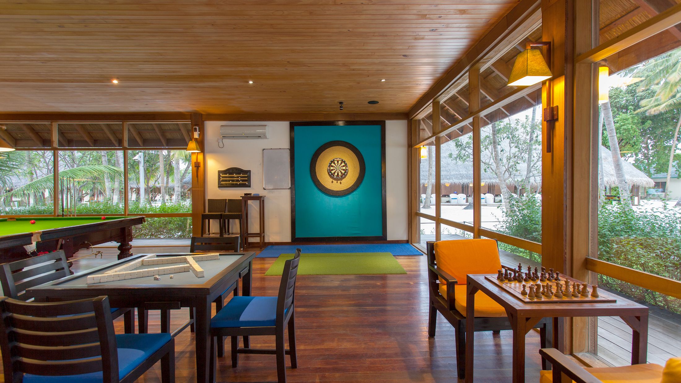 a dining room table in front of a window