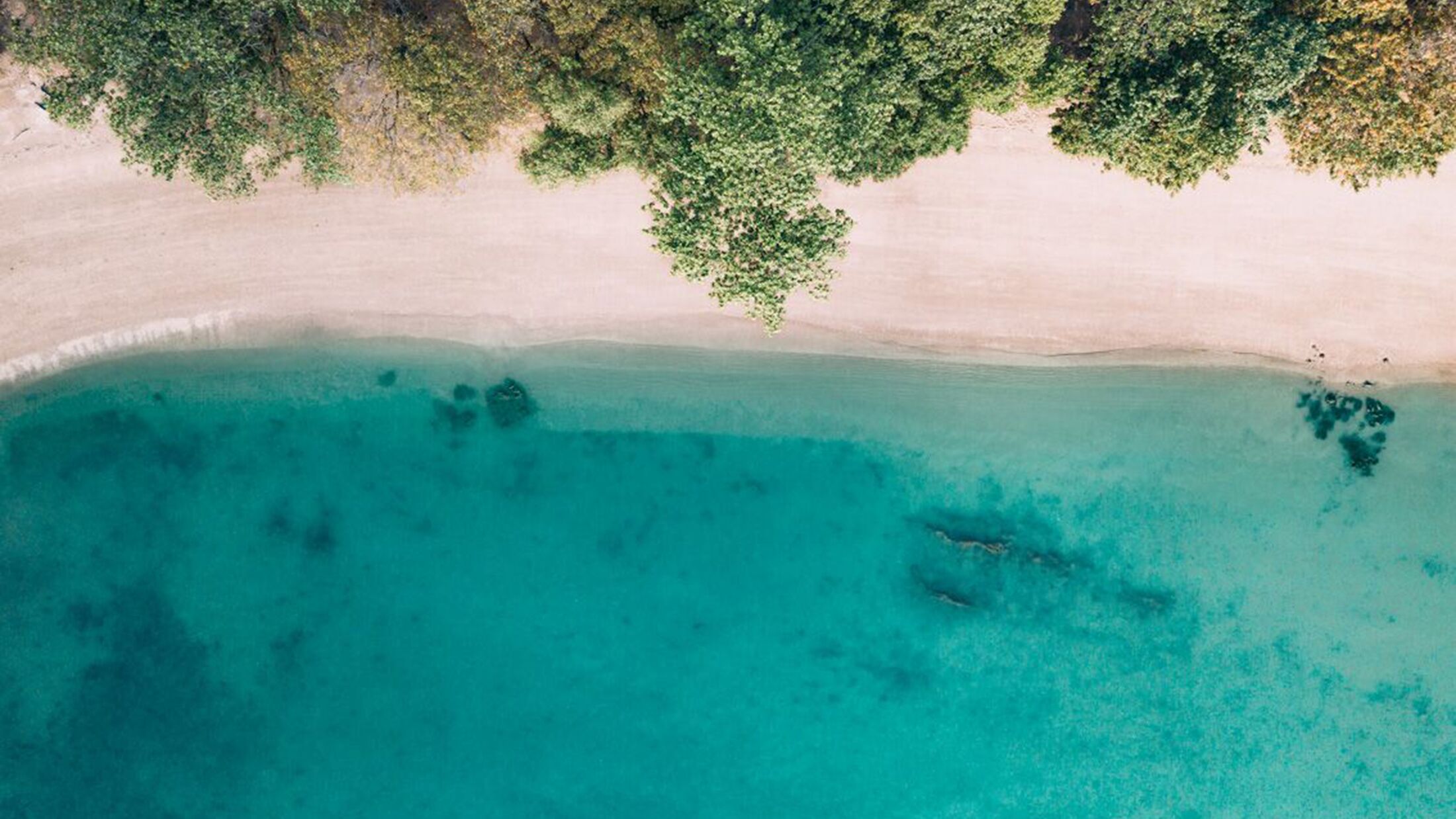 a pool next to a body of water