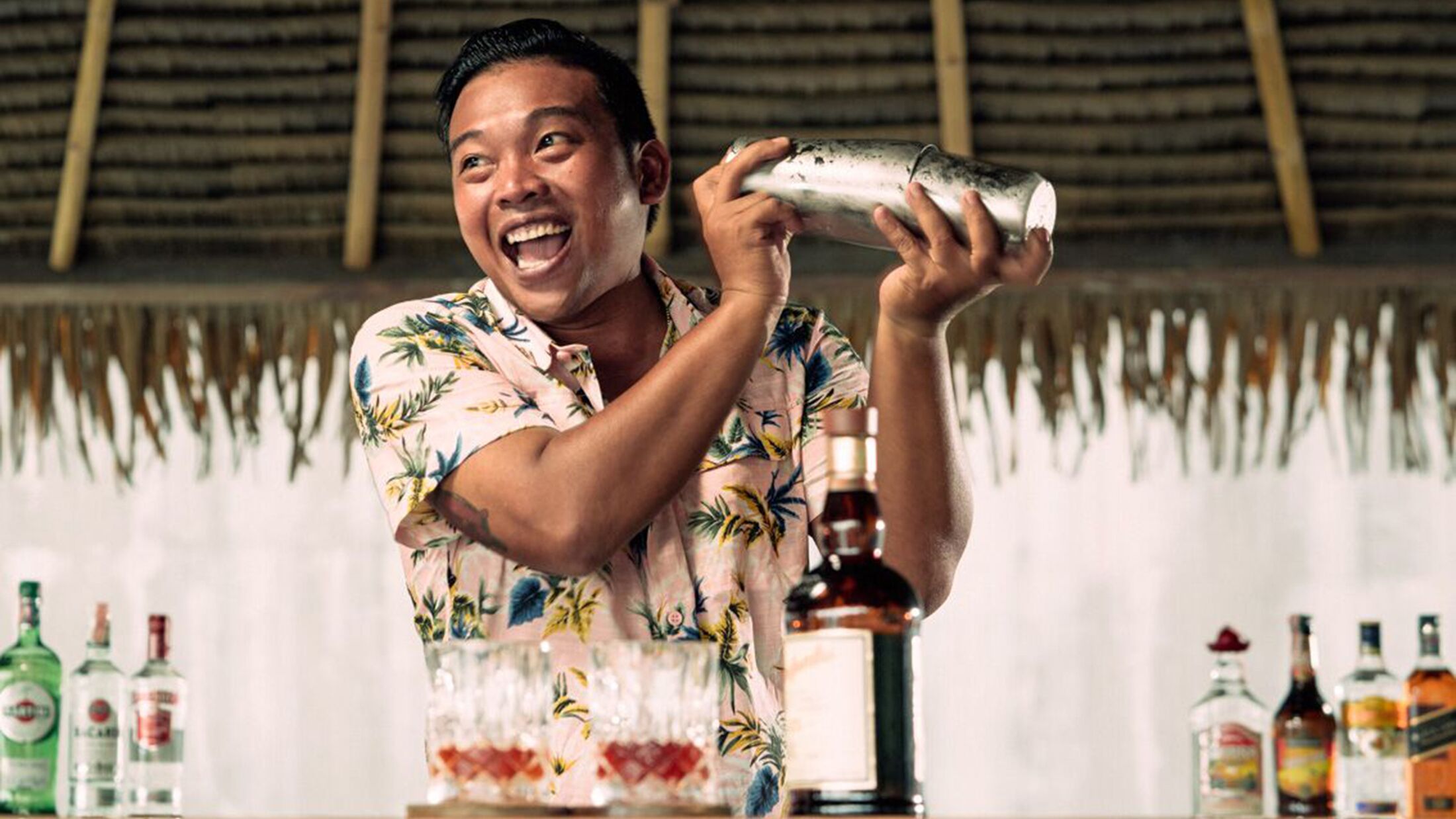 a person holding a bottle of wine