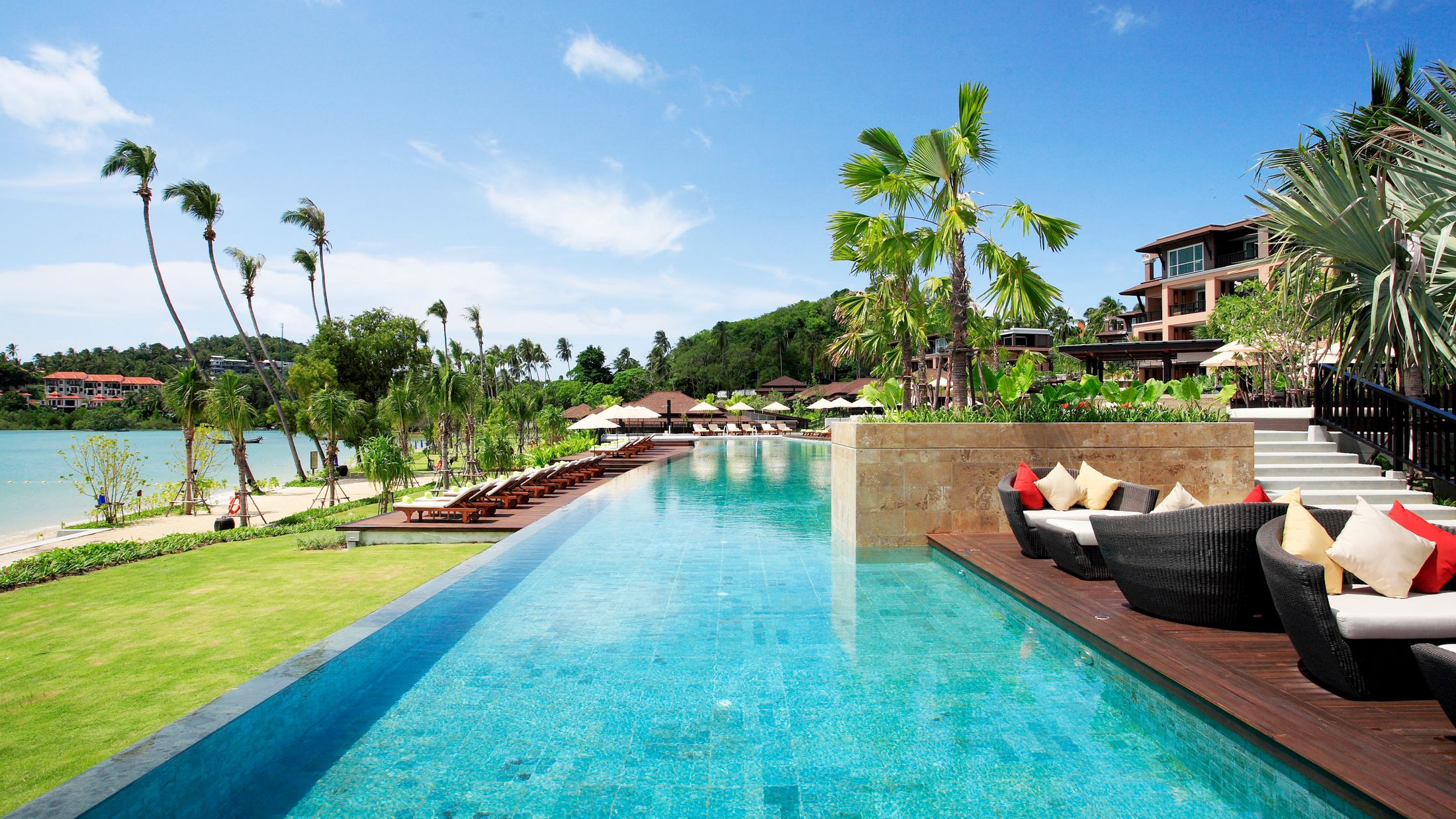 a pool next to a body of water
